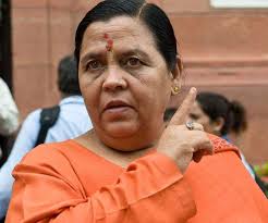 bhopal,Former Union Minister, Uma Bharti , greets policemen involved in encounter