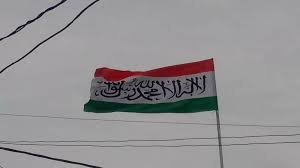 chatarpur, Tricolor flag ,written in Arabic language 