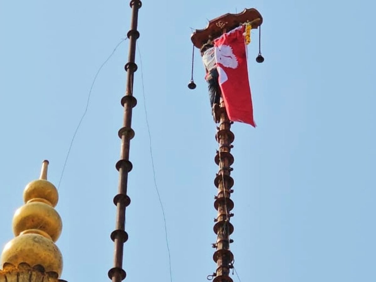 Police launch investigation after green flag at temple and cloth covering idols sparks uproar