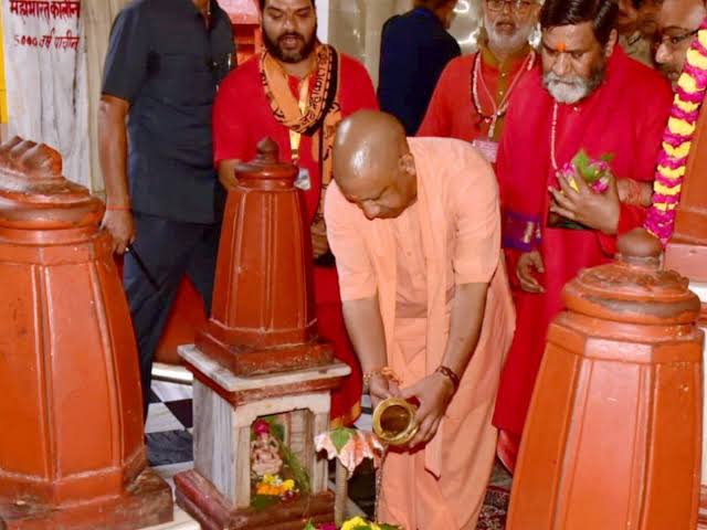  CM Yogi, Pitambara Peeth,  temple doors,closed , security cordon.